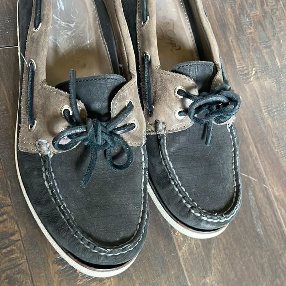 Men’s black and brown Sperry boat shoes